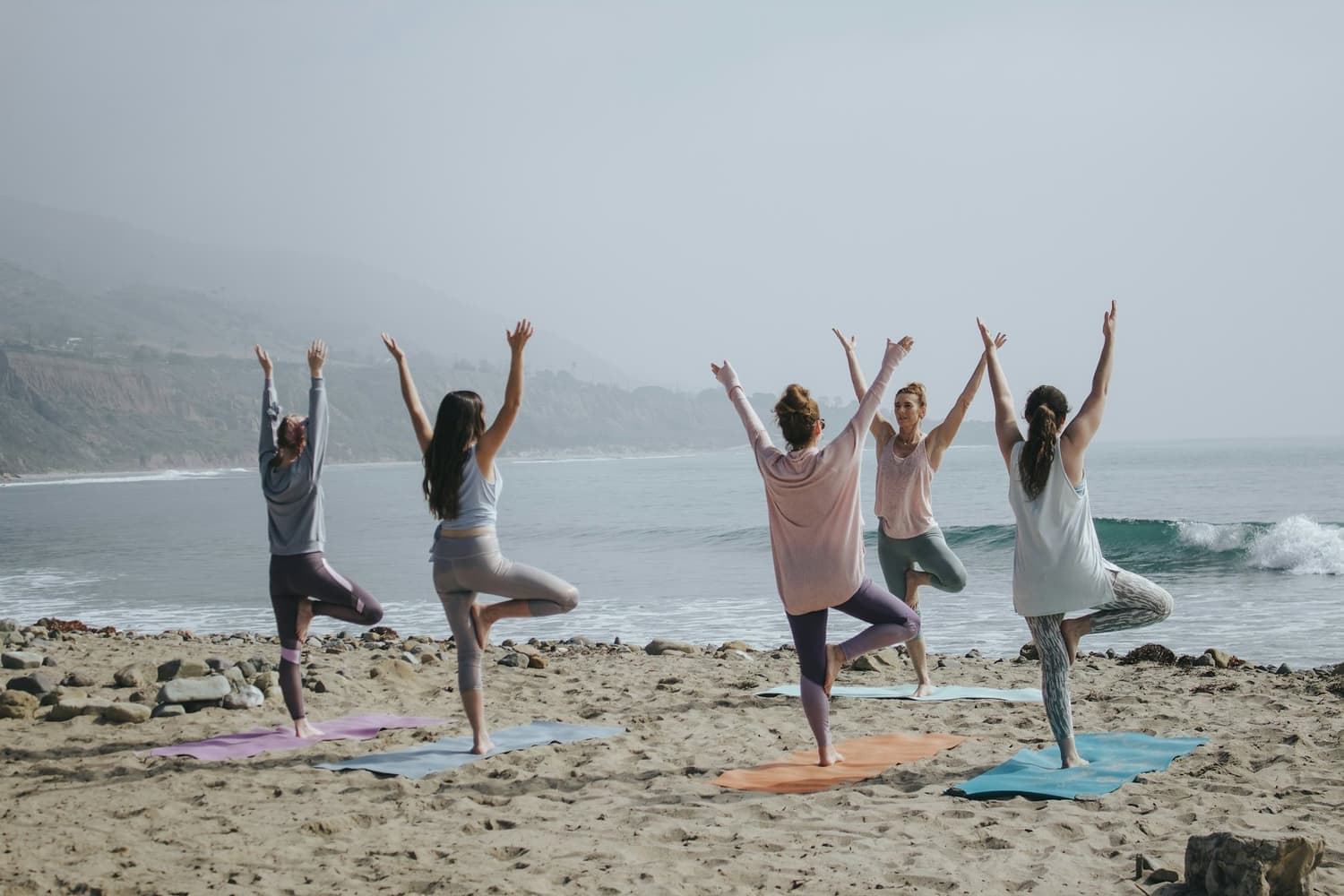Sunrise yoga by the sea